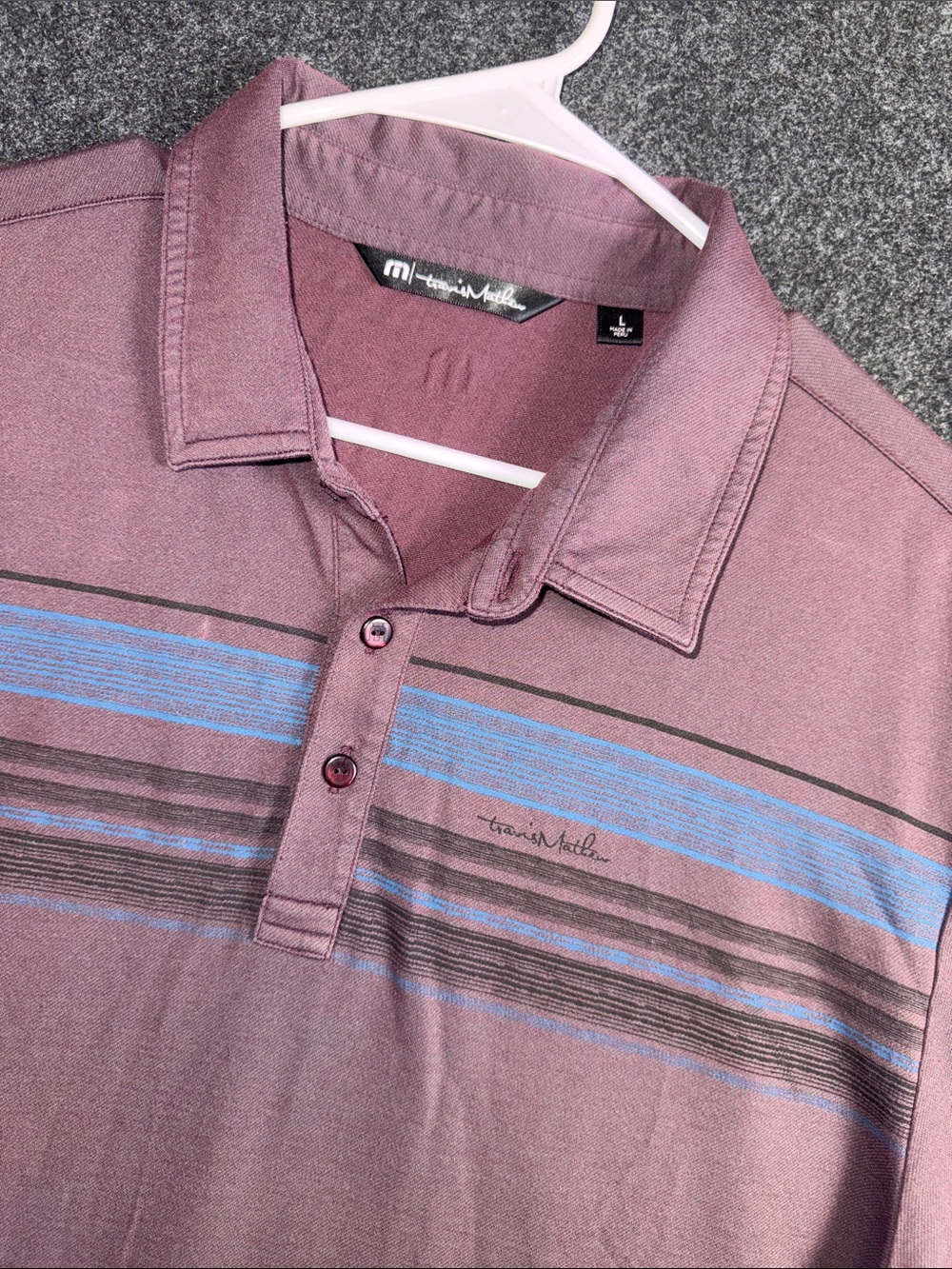 Travis Mathew Mauve Polo with Blue and Black Stripes
